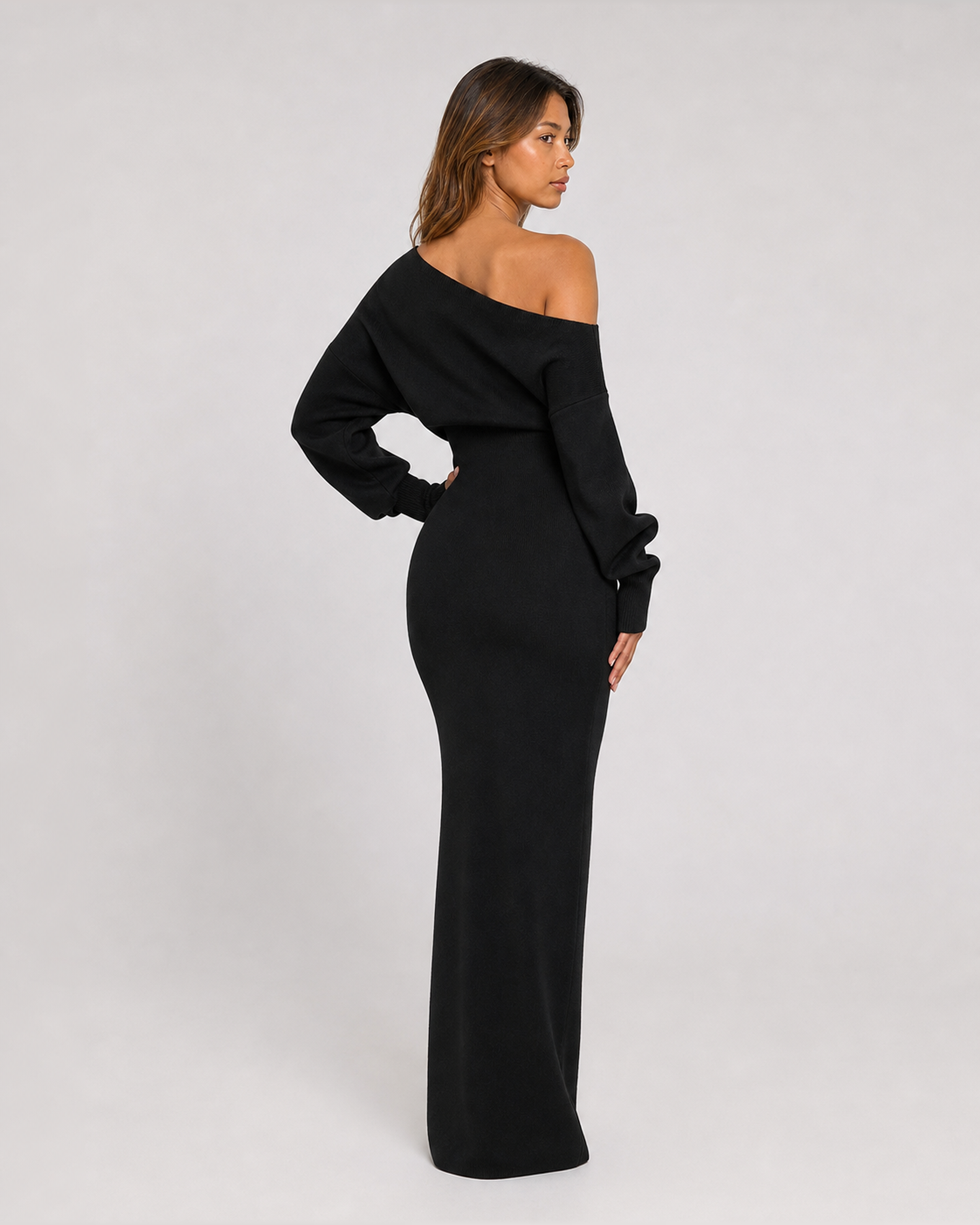 Odette black knit maxi dress, back over-shoulder view