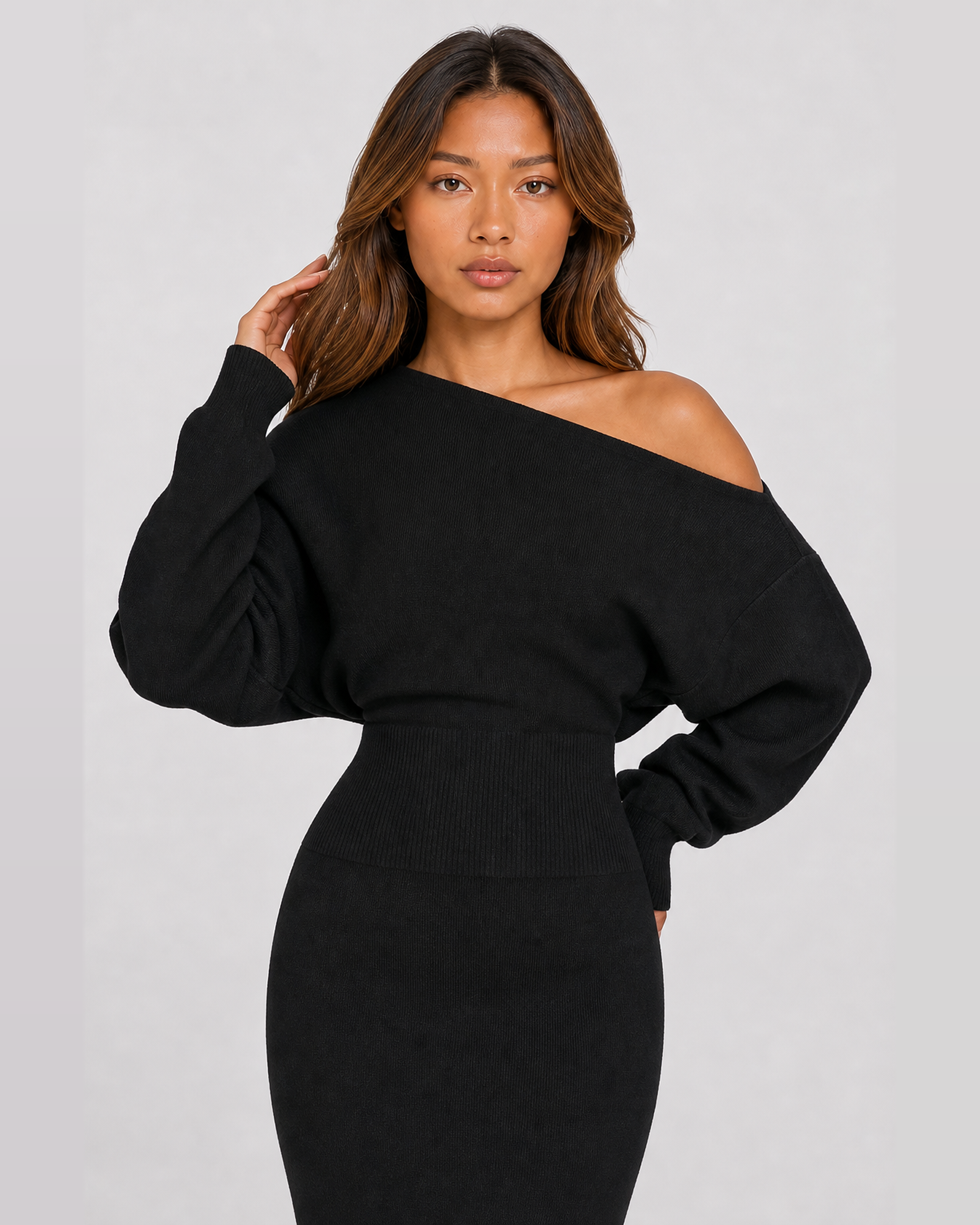 Odette black knit maxi dress, front close-up of ribbed waist and off-shoulder neckline