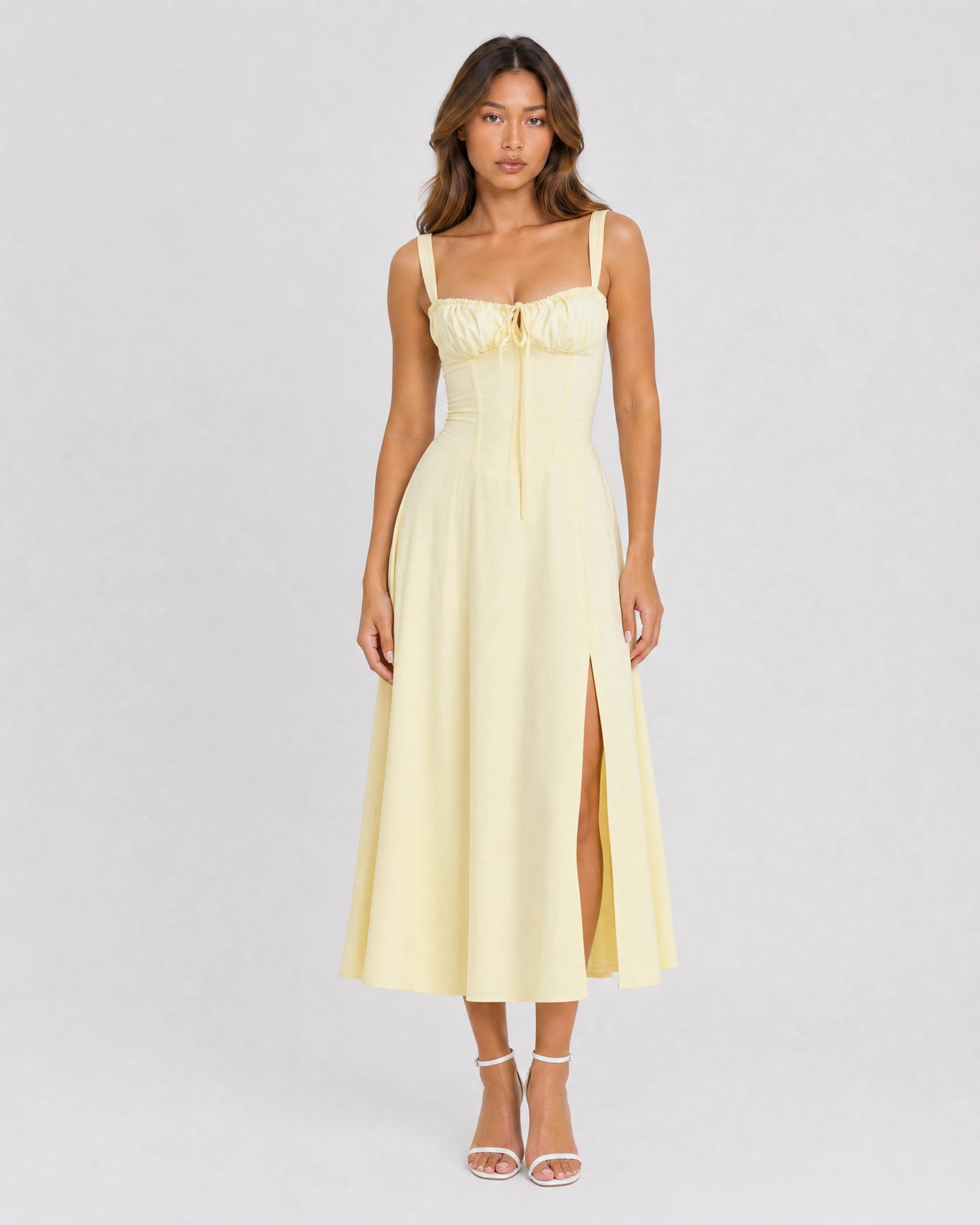 Soleil lace-up corset midi dress in butter yellow, front studio
